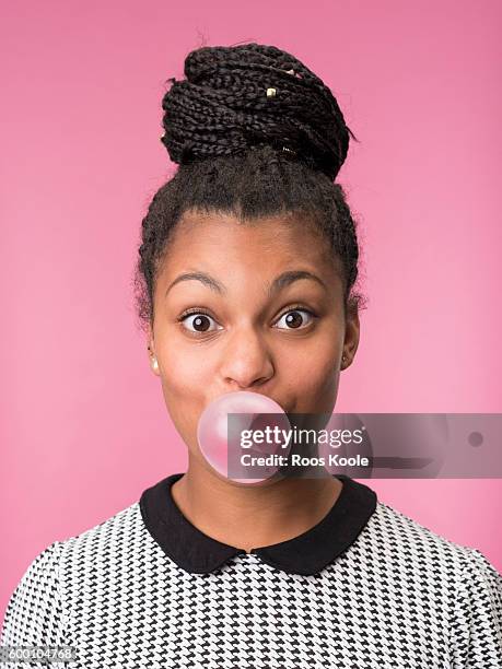 portrait of a young woman with bubblegum. - chewing gum stock pictures, royalty-free photos & images