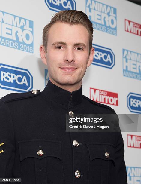 Lance Corporal Richard Jones arrives for Daily Mirror and RSPCA Animal Hero Awards at Grosvenor House, on September 7, 2016 in London, England.