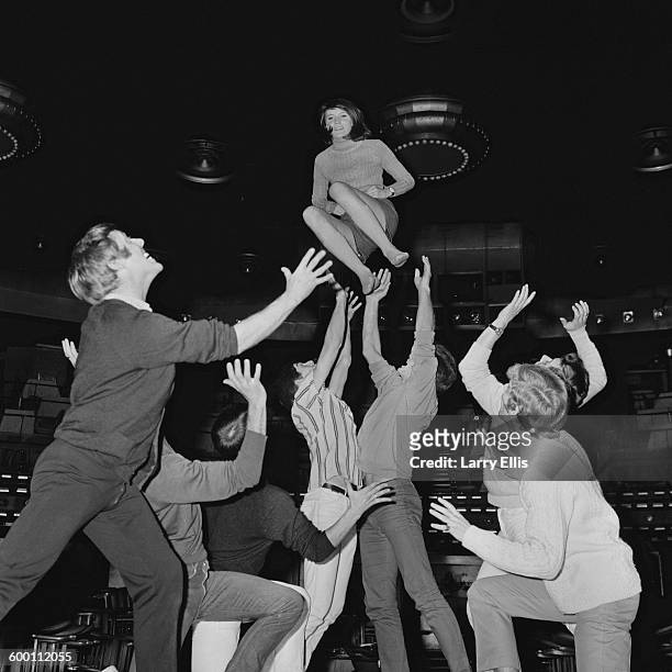 Engish pop singer Sandie Shaw rehearsing for a show at The Talk of the Town in London with the Dougie Squires Dancers, UK, 28th November 1967.
