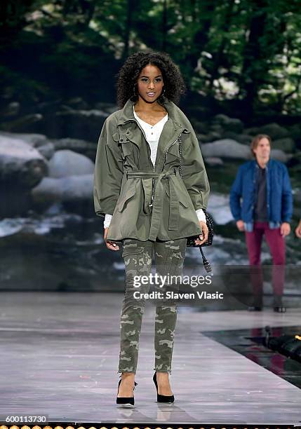 Models walk the runway wearing Rachel Roy as Macy's Presents Fashion's Front Row kicks-off New York Fashion Week at The Theater at Madison Square...