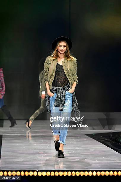 Models walk the runway wearing Rachel Roy as Macy's Presents Fashion's Front Row kicks-off New York Fashion Week at The Theater at Madison Square...