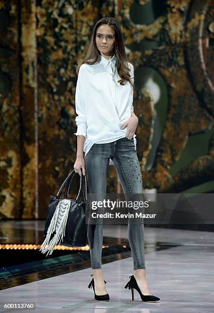 Models walk the runway wearing Rachel Roy as Macy's Presents Fashion's Front Row kicks-off New York Fashion Week at The Theater at Madison Square...