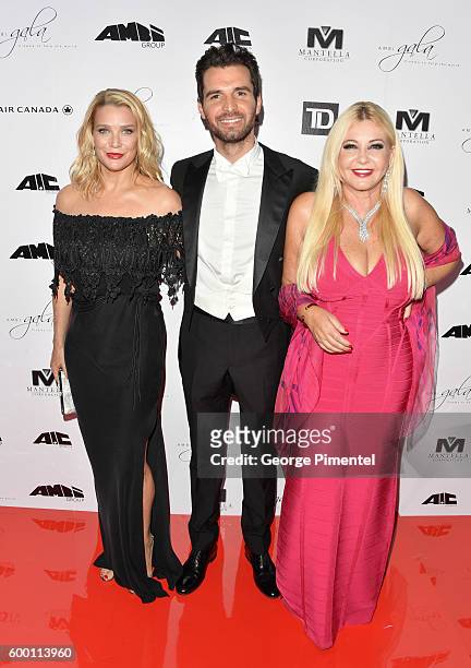 Actress Laurie Holden and AMBI Pictures co-founders Andrea Iervolino and Monika Bacardi attend the 2016 Toronto International Film Festival 'AMBI...