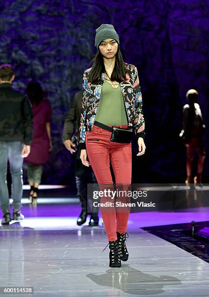 Models walk the runway as Macy's Presents Fashion's Front Row kicks-off New York Fashion Week at The Theater at Madison Square Garden on September 7,...