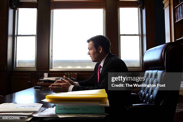 Kansas Secretary of State Kris Kobach discusses the Kansas proof of citizenship requirements for voter registration in his office in Topeka, Ks....
