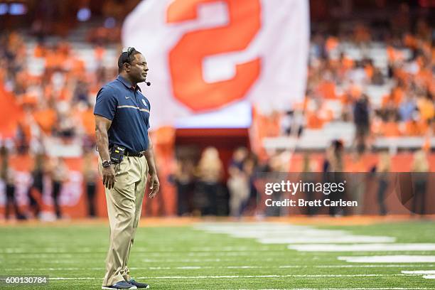 Head coach of the Syracuse Orange Dino Babers walks onto the field during a stoppage in play of the game against the Colgate Raiders on September 2,...