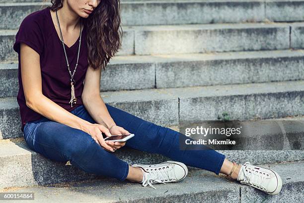 sitting sad and alone - plump girls stockfoto's en -beelden