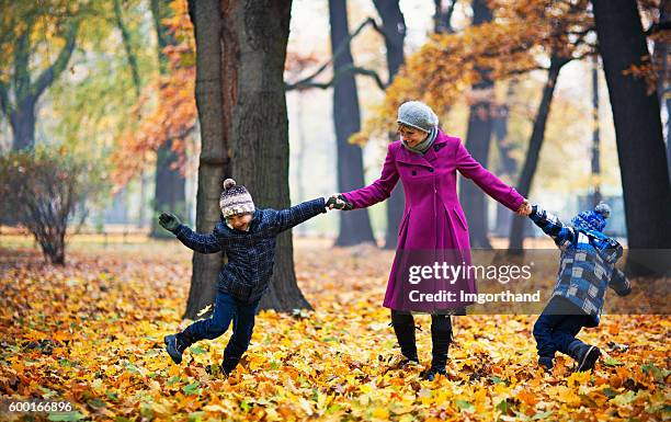 Fall Weather Kids 1,317 Family Enjoying Fall Weather Stock Photos, High-Res Pictures, and ...