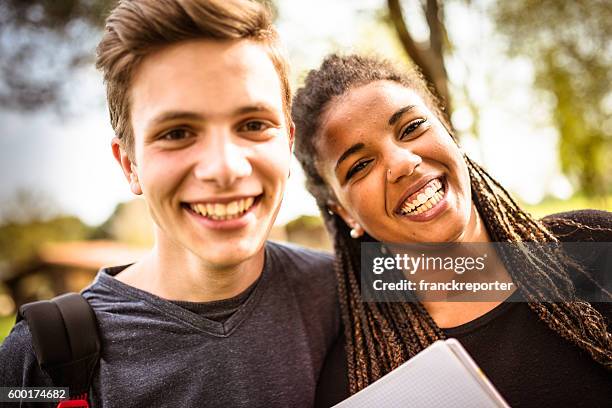 couple of student happiness on the park - 18 23 months stock pictures, royalty-free photos & images