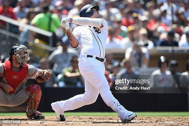 Oswaldo Arcia of the San Diego Padres hits during the game against the Boston Red Sox at PETCO Park on September 5, 2016 in San Diego, California.