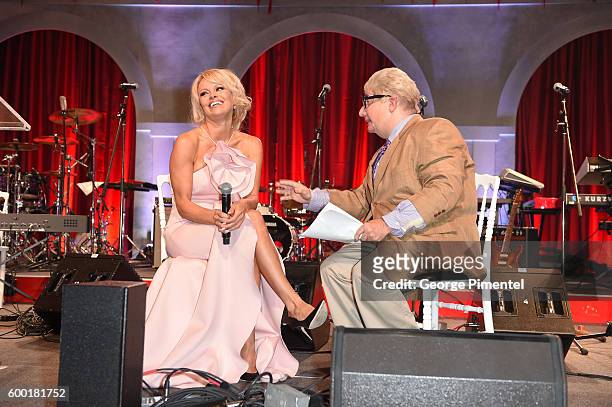 Pamela Anderson and comedian Martin Short, as Jiminy Glick, attend the 2016 Toronto International Film Festival 'AMBI Gala' at Ritz Carlton on...