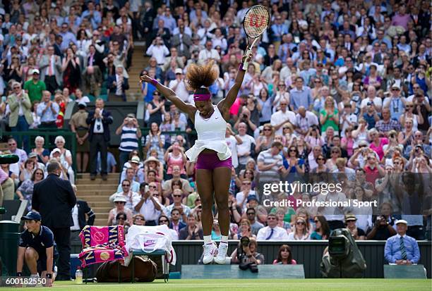 Serena Williams of the USA celebrates match point during her Ladies' Singles semi final match against Victoria Azarenka of Belarus on day ten of the...