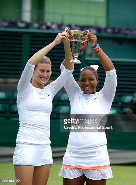 Eugenie Bouchard of Canada and Taylor Townsend of the USA win the Girls' Doubles Final against Belinda Bencic of Switzerland and Ana Konjuh of Crotia...