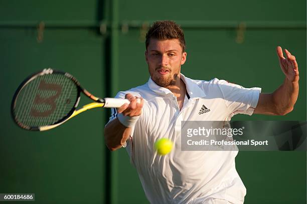 Daniel Brands of Germany in action during his second round match against Nikolay Davydenko of Russia on Day Three of the Wimbledon Lawn Tennis...