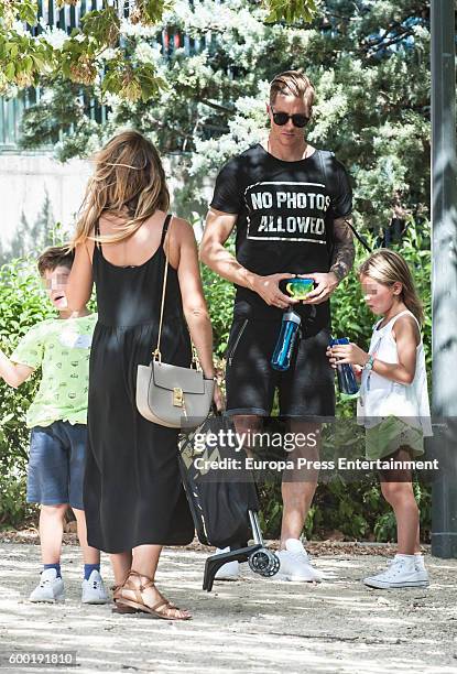 Atletico de Madrid football player Fernando Torres, his wife Olalla Dominguez, their daughter Nora Torres and their son Leon Torres are seen on...