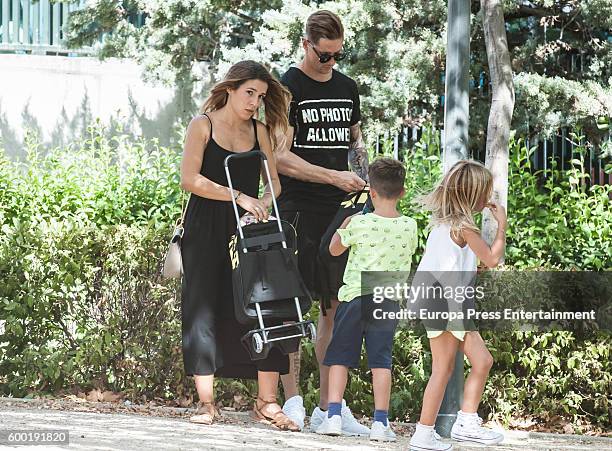 Atletico de Madrid football player Fernando Torres, his wife Olalla Dominguez, their daughter Nora Torres and their son Leon Torres are seen on...