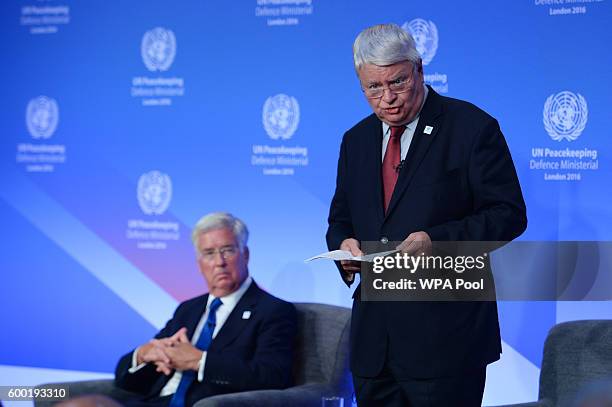 Under Secretary General of the Dept for Peacekeeping Operations, Herve Ladsous, speaks as Defence Secretary Michael Fallon looks on during the UN...