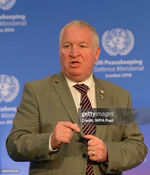 Armed Forces Minister Mike Penning speaks during the UN Peacekeeping Defence Ministerial at Lancaster House on September 8, 2016 in London, England.