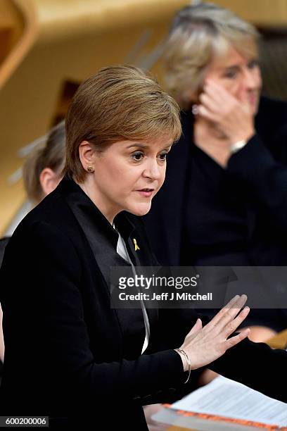 First Minister Nicola Sturgeon, responds to opposition party leaders during first ministers questions on September 8, 2016 in Edinburgh, Scotland....