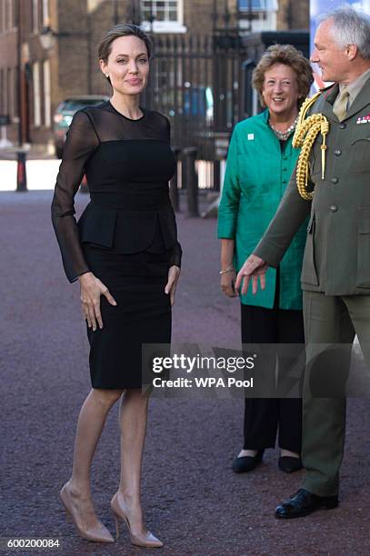 Special Envoy, Angelina Jolie is greeted by UK Vice Chief of the Defence Staff General Sir Gordon Messenger at the UN Peacekeeping Defence...