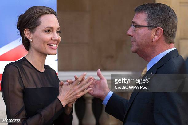 Special Envoy, Angelina Jolie speaks to US Defence Secretary Ash Carter at the UN Peacekeeping Defence Ministeriall at Lancaster House on September...