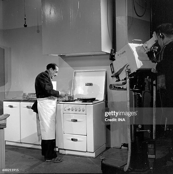 Georges Adet, in front of his stoves, presents "Monsieur X's Recipes".