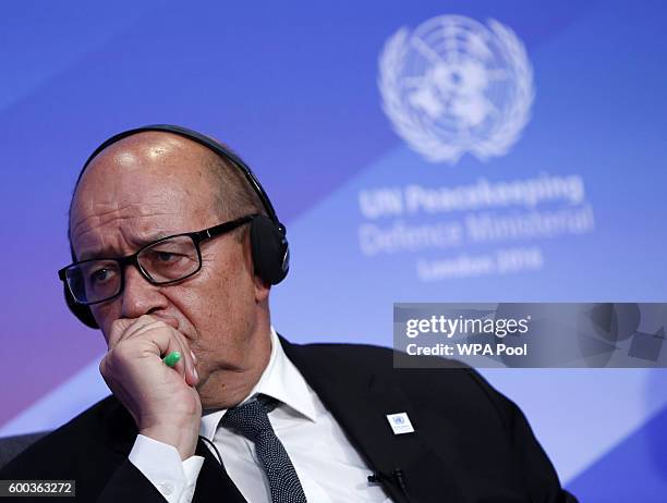 France Defence Minister Jean-Yvres Le Drian listens to comments during "Improving Peacekeeping - Rapid Deployment" during the UN Peacekeeping Defence...