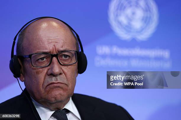 France Defence Minister Jean-Yvres Le Drian listens to comments during "Improving Peacekeeping - Rapid Deployment" during the UN Peacekeeping Defence...