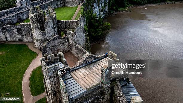 In this handout image provided by Red Bull, Blake Aldridge of the UK dives from 26 metres at Chepstow Castle while enroute to Pembrokeshire for the...