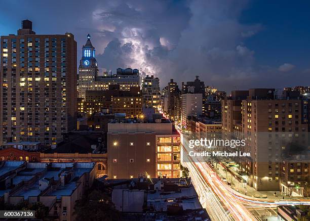 new york lightning and traffic trails - east village stock pictures, royalty-free photos & images