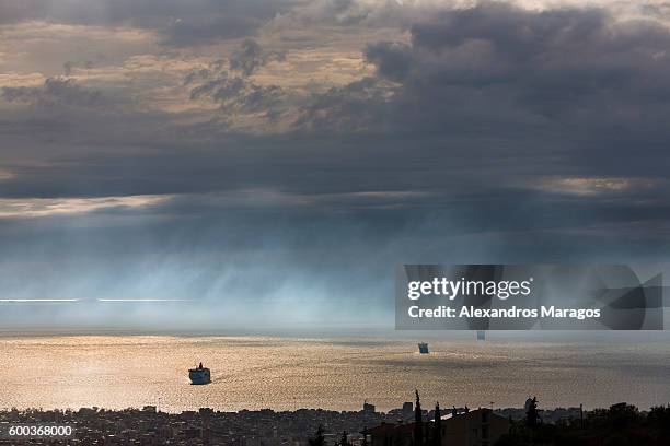 ships in sunset mist in greece - alexandros maragos stock pictures, royalty-free photos & images