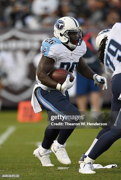 Running back Antonio Andrews of the Tennessee Titans carries the ball against the Oakland Raiders in the second half of their football game at the...