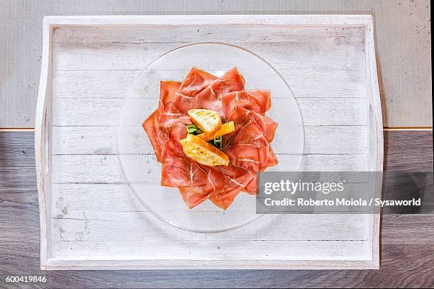 bresaola of valtellina italy - bresaola stock pictures, royalty-free photos & images