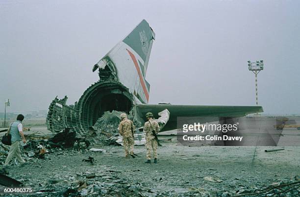 The wreckage of a British Airways Boeing 747-136 at Kuwait City airport, after BA Flight 149 was detained in Kuwait during the Gulf War, 1991.
