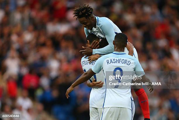 Nathaniel Chalobah and Marcus Rashford of England U21 congratulate Ruben Loftus-Cheek of England U21 during the UEFA European U21 Championship...