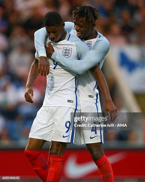 Nathaniel Chalobah of England U21 congratulates Marcus Rashford of England U21 on scoring his hat-trick during the UEFA European U21 Championship...