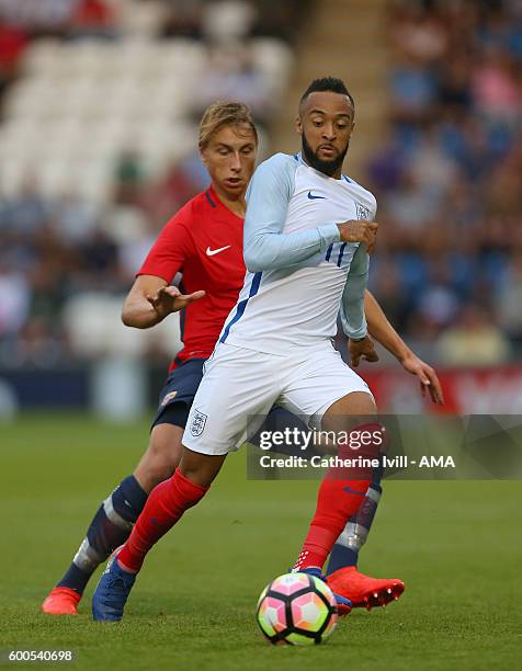 Nathan Redmond of England U21 and Ulrik Jenssen of Norway during the UEFA European U21 Championship Qualifier Group 9 match between England U21 and...