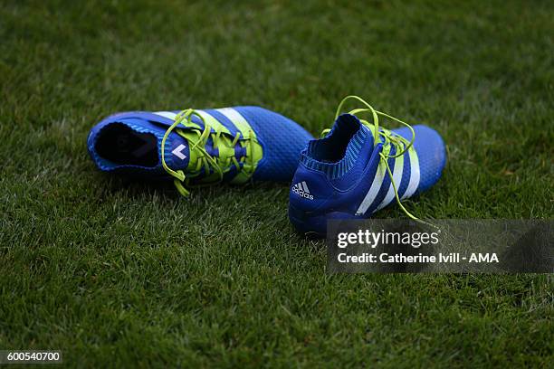 Pair of blue adidas boots lie on the pitch during the UEFA European U21 Championship Qualifier Group 9 match between England U21 and Norway U21 at...