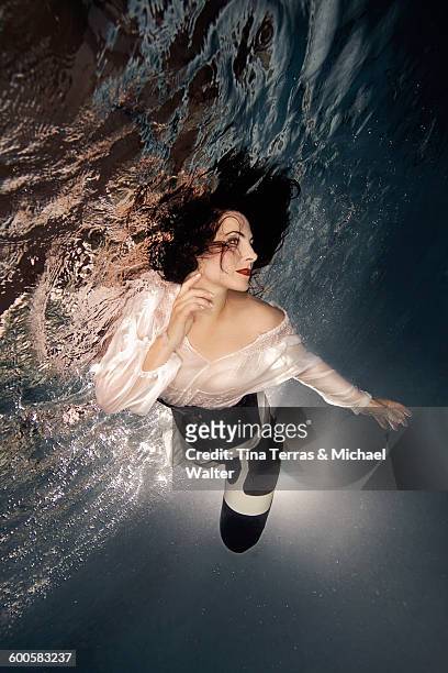 woman immersed underwater - tina terras michael walter stock pictures, royalty-free photos & images