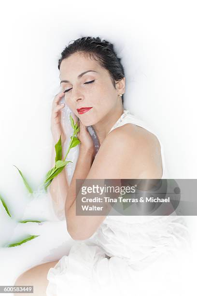 woman lying in white dress - tina terras michael walter stock pictures, royalty-free photos & images