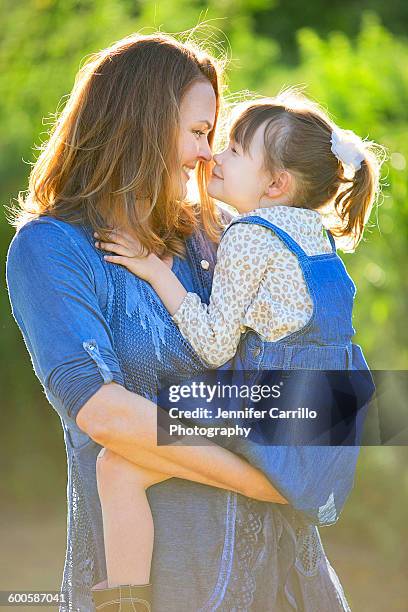 mommy and daughter nose to nose - santa clarita stock pictures, royalty-free photos & images