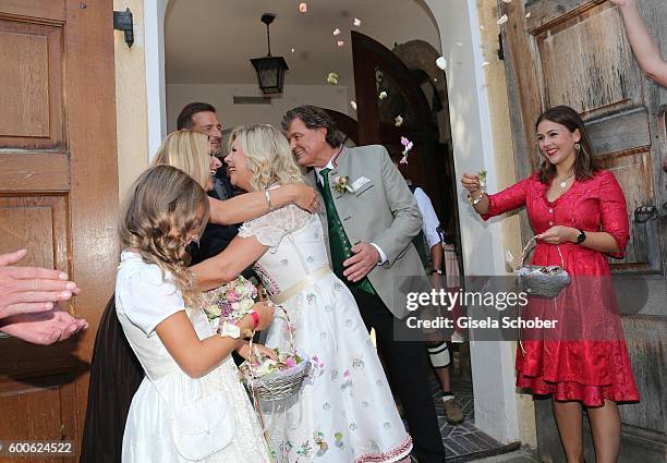 Bride Marianne Hartl and her husband bridegroom Michael Hartl , Stefanie Hertel during the wedding of Marianne and Michael Hartl at St. Laurentius...