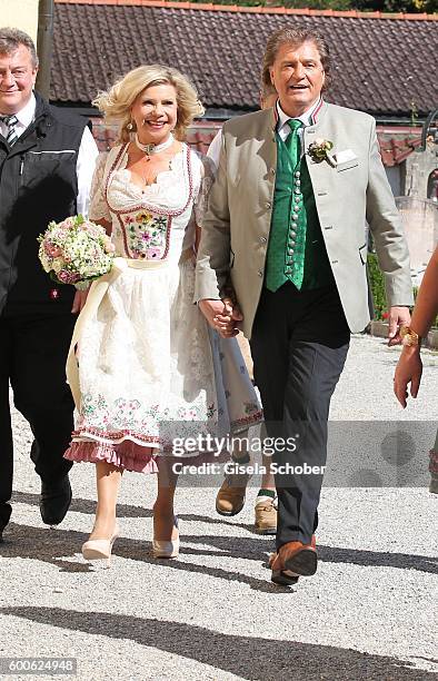 Bride Marianne and her husband bridegroom Michael Hartl during the wedding of Marianne and Michael Hartl at St. Laurentius church on September 8,...