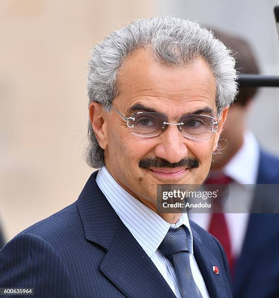 Member of the Saudi royal family Al-Waleed Bin Talal bin Abdulaziz al Saud meets French President Francois Hollande at Elysee Palace in Paris, France...