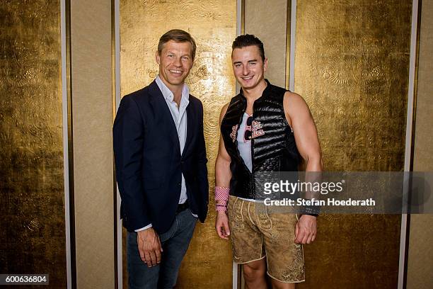 Frank Briegmann of Universal Music and singer Andreas Gabalier pose for a photo during Universal Inside 2016 organized by Universal Music Group at...