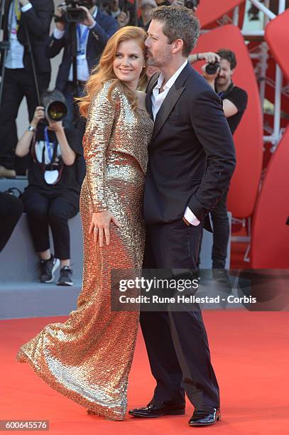 Amy Adams and Darren La Gallo attend the premiere of 'Nocturnal Animals' during the 73rd Venice Film Festival at on September 2, 2016 in Venice,...