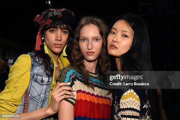 Models pose for photographs backstage at the Desigual fashion show during New York Fashion Week: The Shows September 2016 at The Arc, Skylight at...