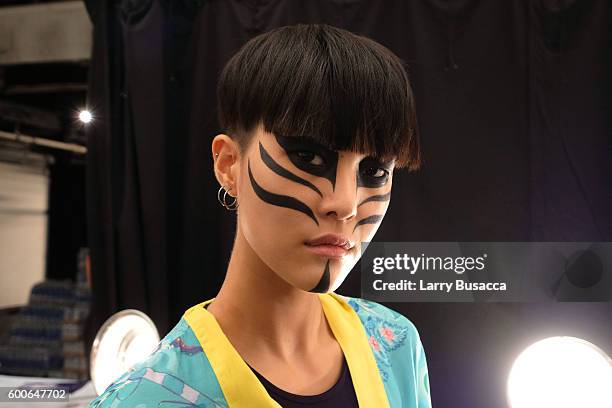 Model poses for photographs backstage at the Desigual fashion show during New York Fashion Week: The Shows September 2016 at The Arc, Skylight at...