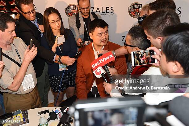 Inductee Yao Ming speaks to the media during the Class of 2016 Press Event as part of the 2013 Basketball Hall of Fame Enshrinement Ceremony on...