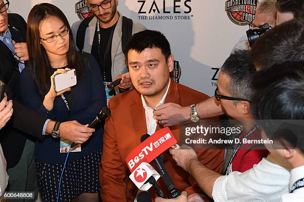 Inductee Yao Ming speaks to the media during the Class of 2016 Press Event as part of the 2013 Basketball Hall of Fame Enshrinement Ceremony on...